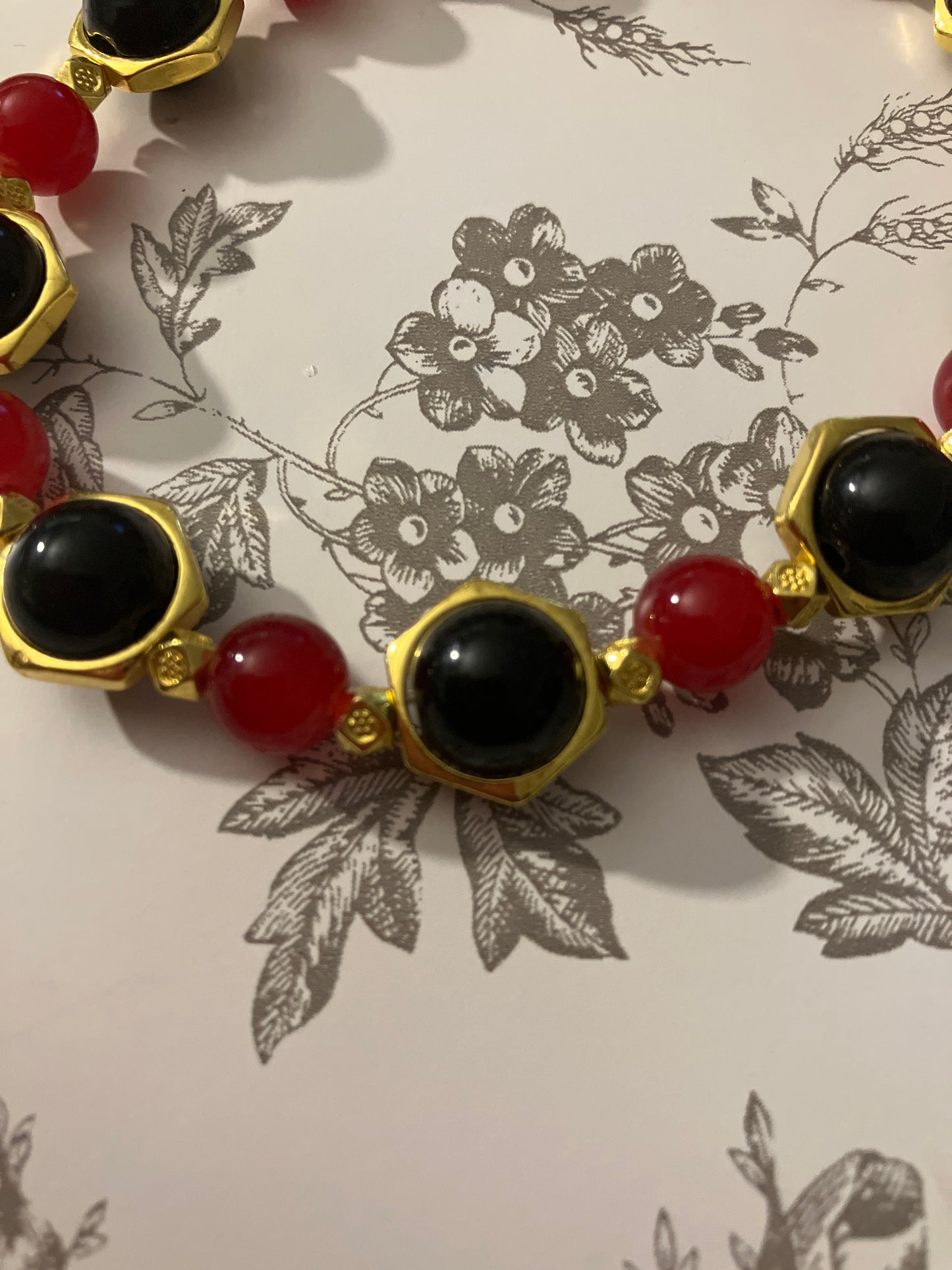 Black and Red with gold Frames